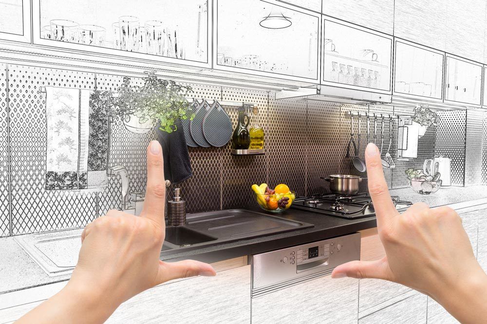 Pair of hands envisioning new kitchen remodel