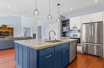 Modern kitchen remodel: island counter top with sink.