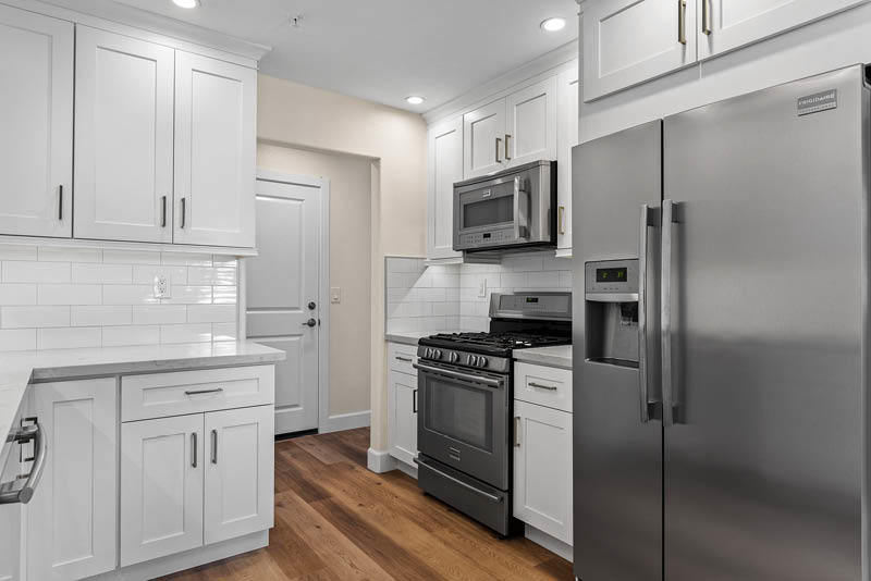 Petaluma remodel home featuring white decor kitchen interior with amenities.