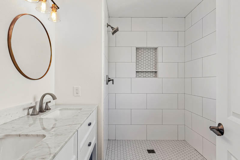 White decor remodeled bathroom in Residential Petaluma Home
