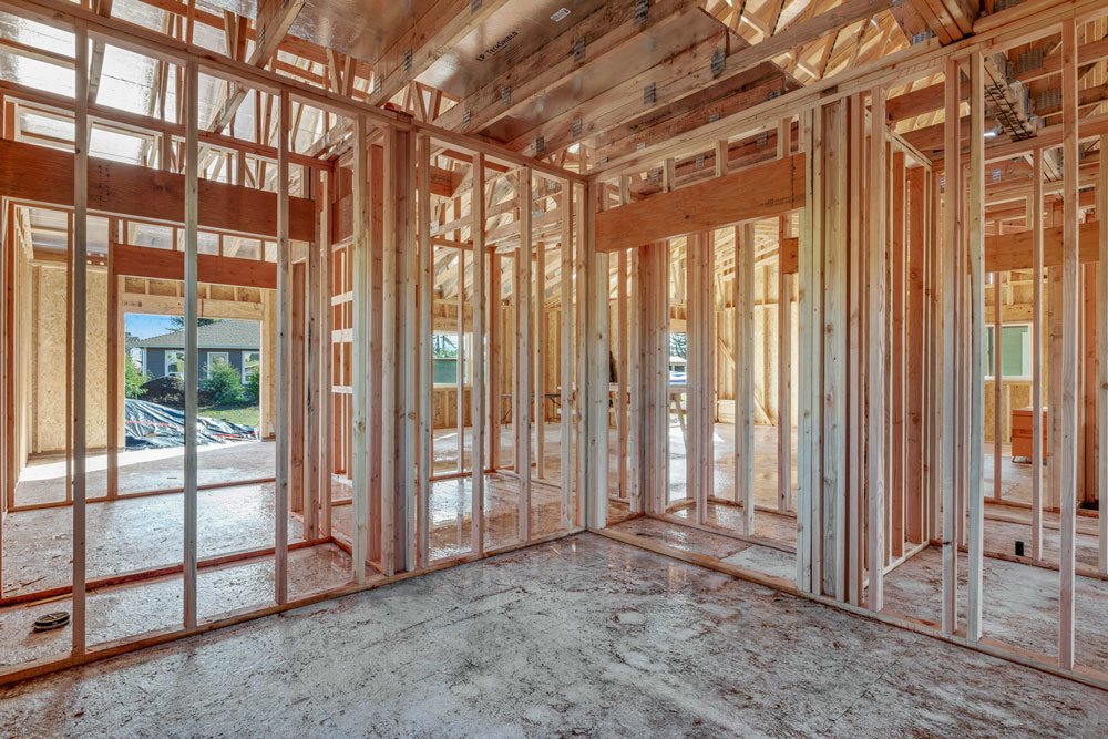 new home construction in coffey park, exposed rafters and wall framing