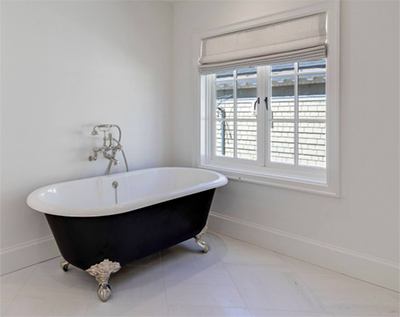 clawfoot tub in a historical home remodel