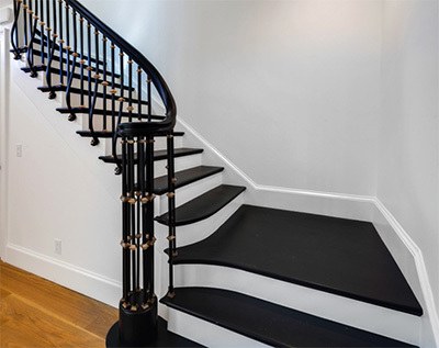 restored staircase in a historical home remodel 