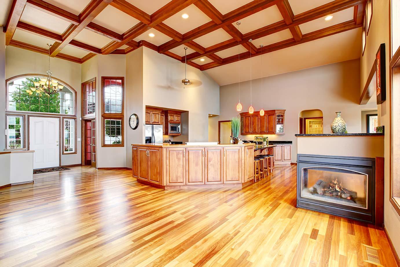 light wood floor in well-lit luxury home entry with sunshine reflecting