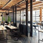 modern office with floor to ceiling windows and open layout