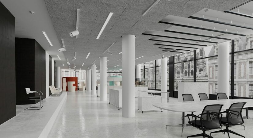 Large white room with many round white pillars and acoustic panels in parts of the ceiling.