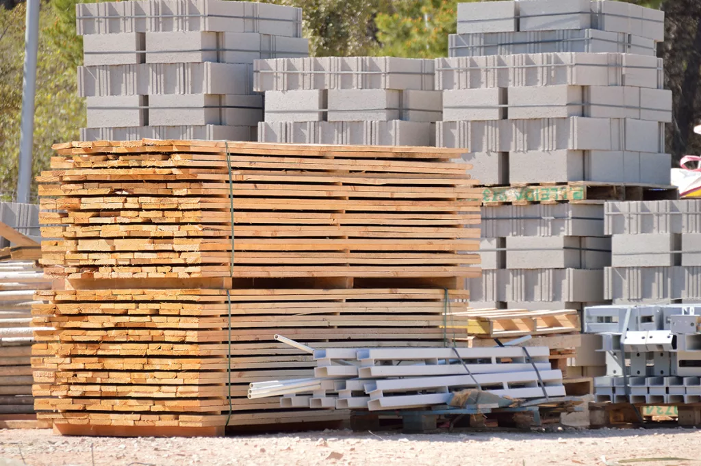 Stacks of construction materials at a construction site